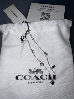 COACH Silver-Tone Charm Bracelet with Heart & Logo Charms